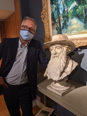 David Stern at the Stern Pissarro gallery by Camille Pissarro's bust