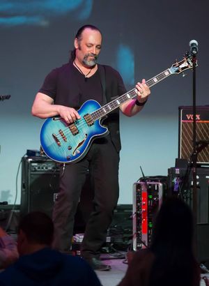 Bassist Pete "Cal" Calamera with the EX Bass in Blueburst.