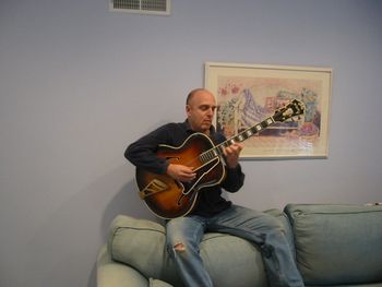 Gary plays a late 1940's D'Angelico Excel Model
