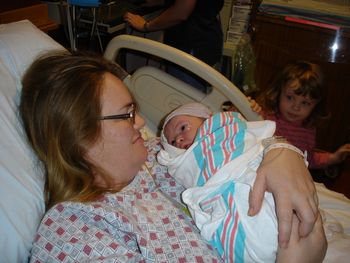Phil's son, Philip Thomas Calder III, was born on October 8, 2006, 2 days shy of the 8-month anniversary of his father's death. Here is the brave boy, with his brave mother.
