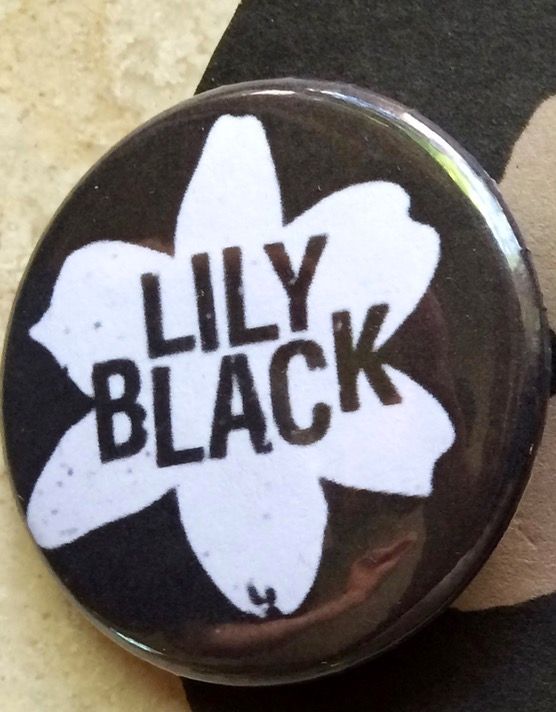 Lily Black button! Black with white Lily.