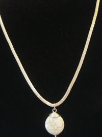 Choker style white stone on silver tone braided chain