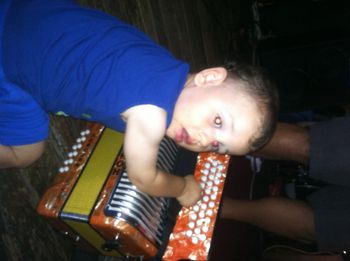 Jesse stealing Michael's accordion.
