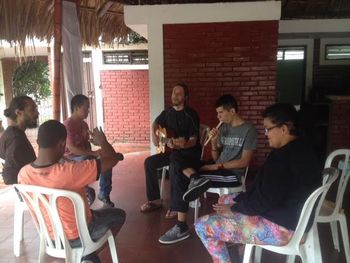 co facilitating a music class of young adults with autism and down's syndrome
