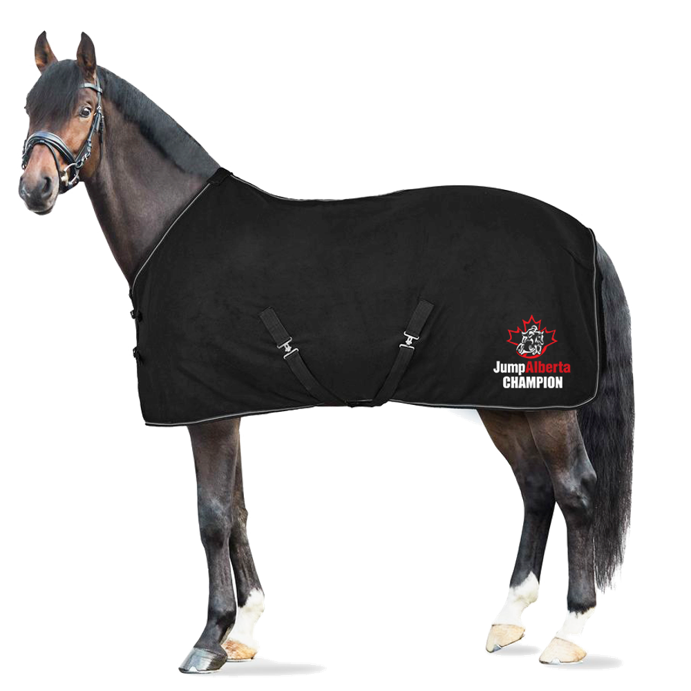 CHAMPION FLEECE 
Kiel rug is made from soft fleece and designed in a stunning black seasonal color.
The material keeps your horse dry and quickly absorbs any moisture. 
A double front closure with buckles and hook-and-loop fasteners, as well as X-surcingles and a tail cord, keep the rug in place. 
Pretty piping along the trim matches the colors of the rug perfectly.