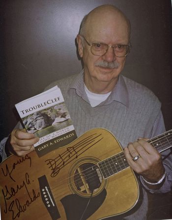 Gary posing with his book, TroubleClef, 2009
