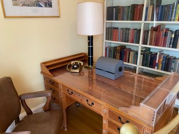 President Eisenhower's desk constructed with yellow pine boards from the White House and based on George Washington's desk. Ike would use the desk to conduct presidential business, including calling other world leaders. and signing bills into law.
