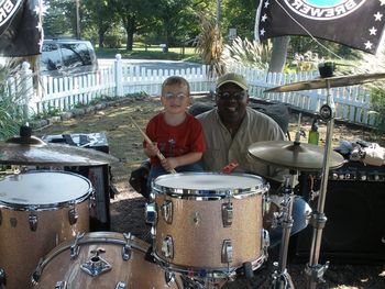 Philip coaches an auditioner on the fine points of maintaining rhythm with the Rhythm Kings.
