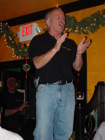 Pub owner Jerry O'Bryan sings along with "The Pirate Song".
