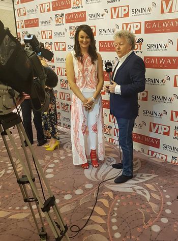 Olivia chats with the gentleman that is Bob Brolly of the BBC at this year's Hot Country TV Awards Concert.
