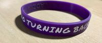 2 x  "NO TURNING BACK" purple wristbands