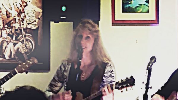 Debut of Stephanie's new song, "G.P.S." at the Juice 'N Java Cafe.