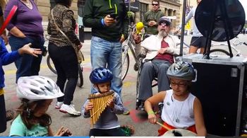 Siama & Dallas hosting an Instrument Petting Zoo for Hennepin Theatre Trust's Open Streets event in 2015 (photo by Dallas Johnson)
