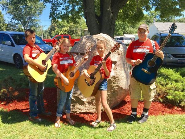 The Cripple Creek Kids are middle school-age students who are budding guitarists and great vocalists too.