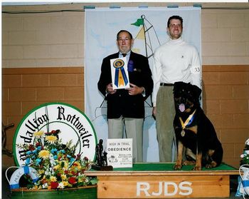 CH OTCH CT Phantom Wood Corydon Dreu, UDX5, TDX, RN winning High in Trial at the Medallion Rottweiler Club Specialty Show with co-owner/trainer Drew Randall.
