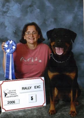 ARCH Phantom Wood Go For Broke, UD, TD, AX, AXJ, RAE, VCD2, ASCA CDX, (Tae) placing at the All Star Obedience and Agility Championship in Rally Excellent with owner Brenda Finnicum.
