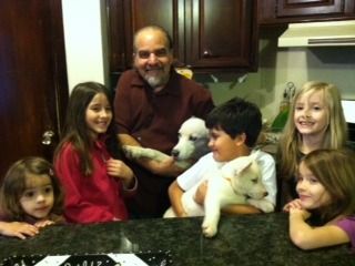 Here is one of Maya's puppies leaving with the Ruiz family.
