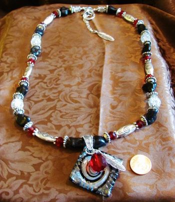 Gemstone necklace, lampwork 2" pendant SW, cowgirl style. $85.00
