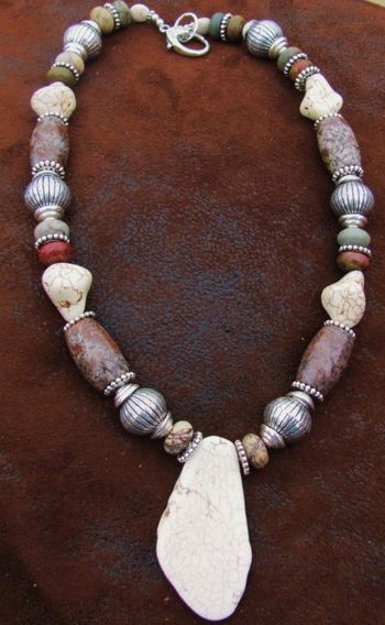 Huge , chunky gemstone necklace, white turquoise, brown silver.$85.00
