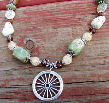Gemstone, silver necklace,wagon wheel. sold
