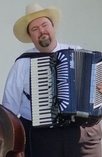 Toby Hanson - Toby plays accordion with the Jangles, as well as serving a band leader for the Smilin' Scandinavians. He is  a member of the Valse Café Orchestra, and studied classical composition at Cornish where he graduated Magna Cum Laude. Toby is a member of the Seattle Chapter of the Western Swing Hall of fame. Toby makes his home in Grahm WA. 