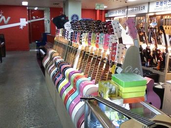 The Music Mall in Seoul, a whole city block of every musical instrument you could imagine. Here, a rainbow of guitars
