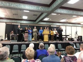 Ernie and Debbie singing with the whole gang and the "band" at the Smokey Mountain Camp Meeting 2013. What a time we had at this meeting.
