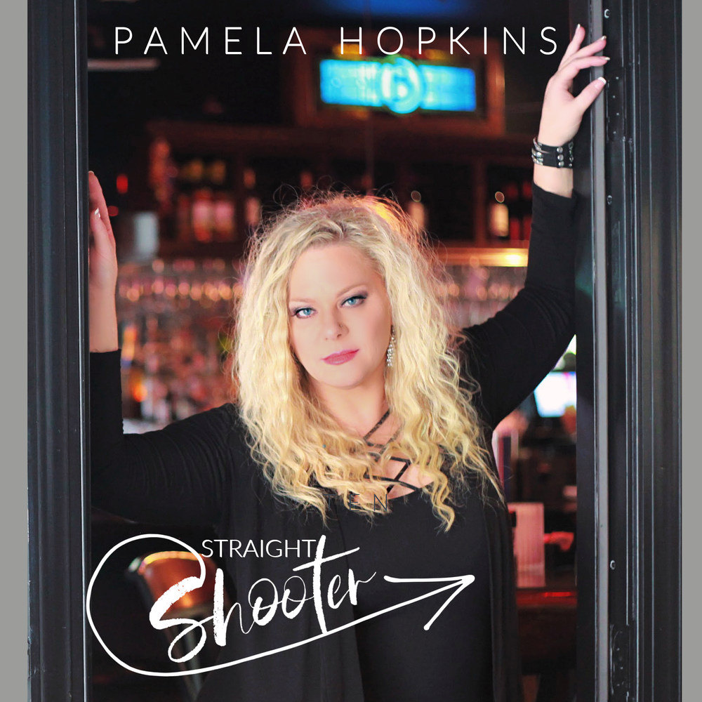 Pamela is a GRAMMY voting member and an Official Nominee for Country Artist of the Year, Female Vocalist of the Year and Album of the Year for "Givin' a Damn (Don't Go With My Outfit)"  for the Arkansas County Music Awards.  Her newest single, "Straight Shooter," dropped July 29th and it's available on all streaming platforms.  She is also sponsored by Skrewball Peanut Butter Whiskey--If you haven't tried it yet, git you some!