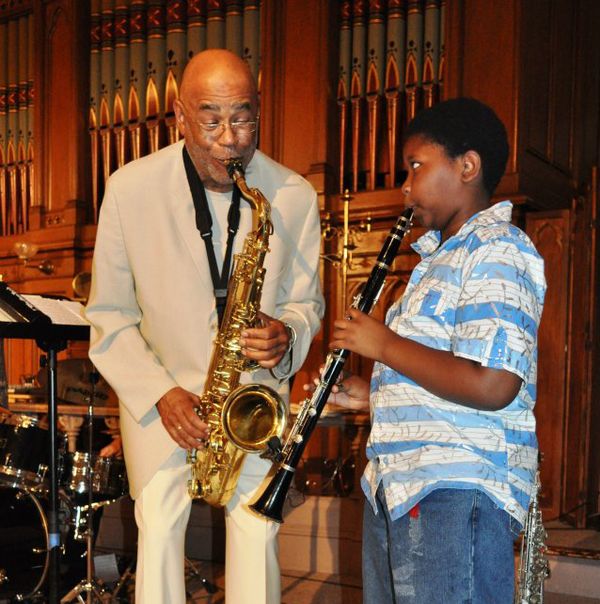 Reggie Houston with Francis Scroggins Ocansey