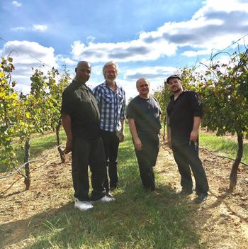 Standing in the vineyards, who needs a brick wall for a band photo, well take the vineyard lol
