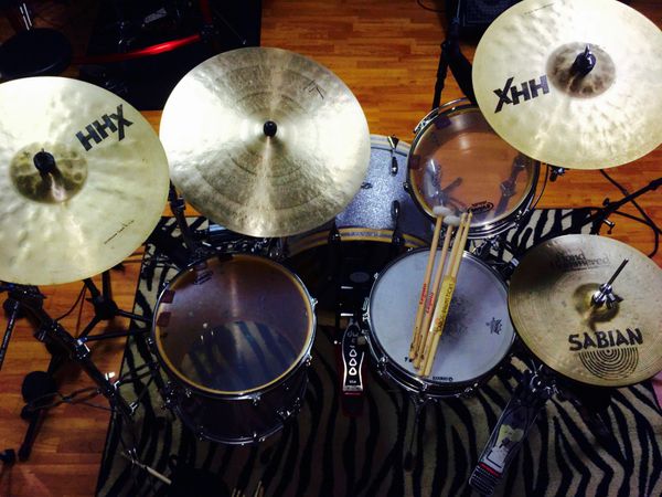 Stone Custom Drums, Sabian Cymbals, Los Cabos Drumsticks, and Evans Drumheads at the Happy Hands Club Recording Studio. 