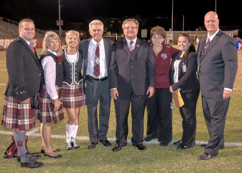 Mr Spreen and his staff at his final MPA performance and the Kiltie Band's 24th Superior Overall rating.