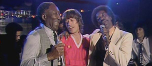 Playing with Muddy Waters when The Rolling Stones joined in.