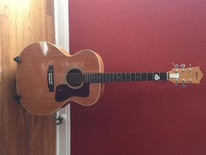 This is my 1980(?) Takamine jumbo flat top accoustic. I bought this from Gary Heard back in the Lone Star Studio days. It is a clone of the Guild jumbo of the same era. It has a very nice big sound and I used it on "The Torch", "Fortune Morning" bridge, and "Take a Little Time."