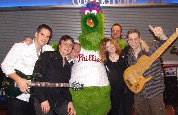 New York fans posing with the Philly Phanatic at Citizens Bank Park...Imagine That!