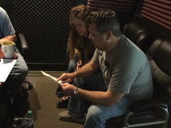 Michelle and producer Shane reviewing final details before recording vocals.
