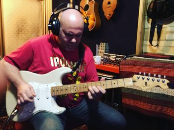 Photo by:  John Seda. Fred in the Studio today at Rising Sun Music with his Christmas Present!  Fender Strat.  Fits Perfect Fred Chandler !
