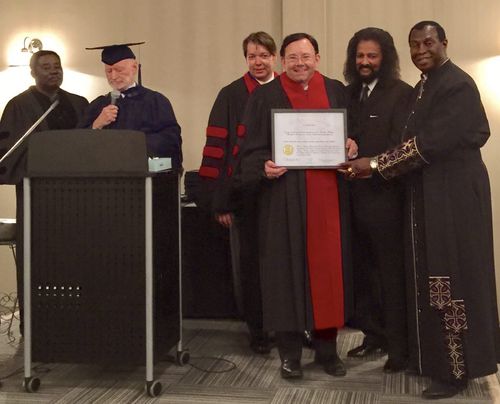 Steve Kuban Receiving Honorary Doctor of Divinity Degree