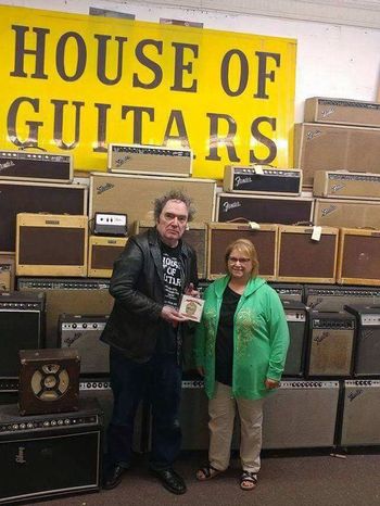 Karen with House of Guitars owner, Armand, Rochester, NY, USA. Karen took Dave Preston to HOG back in the 90's where Armand sold Dave his first Les Paul which he still plays today
