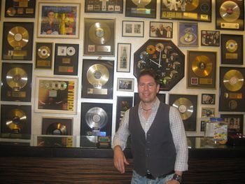 In front of the 'wall of fame'
