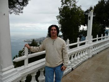 Chris Colby outside a shrine way up high on a mountain overlooking the Mediterranean Sea.
