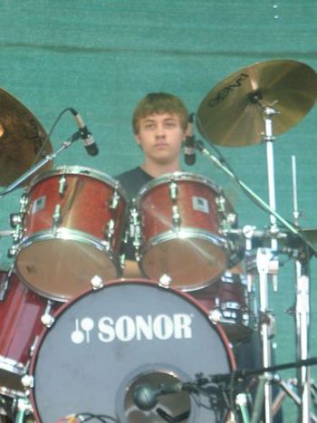 Thomas Duell sits in on the drums for a song.

