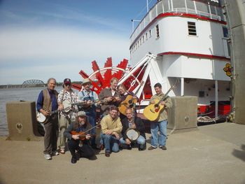 John Hartford String Band reunion on the Belle Of Louisville IBMA week 2003...Pictured left to right standing; Peter Wernick, Bob Carlin, Mike Compton, Matt Combs, Katie Lauer, Chris Sharp, Kneeling Left to Right: Ted The Fiddler, Mark Schatz, and Larry Perkins

