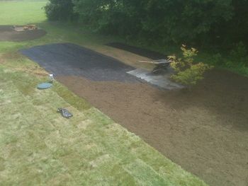 SOD, FABRIC AND MULCH INSTALLED TO MAKE A BACKYARD OASIS
