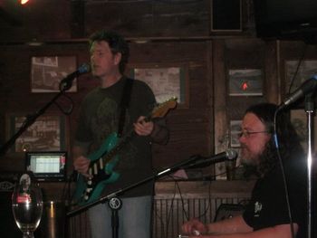 Chris Connolly on guitar and Chris Ramey on steel with the L-Town Allstars @ Dillinger's, Lafayette, CO, 1-28-2011.
