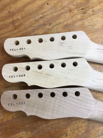 Three necks stamped and ready for assembly
