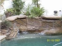 Waterfall added to the deep end of a pool.
