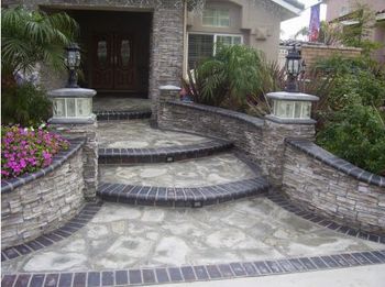 Application of bull nose, stamped concrete and stacked stone.
