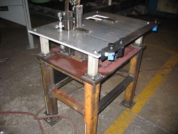 Welding Table with pneumatically controlled fixtures to hold assemblies together during welding process.
