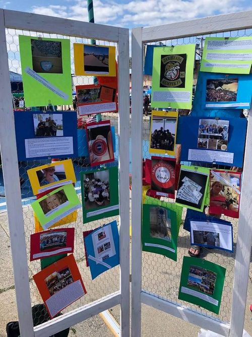 Fans' pledges and pictures of their acts of kindness displayed at the 2019 Ramble